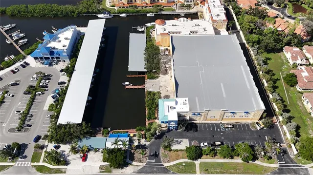 an aerial view of houses with outdoor space