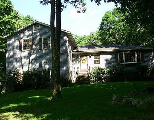 32 Codfish Hill Rd Extension Bethel, CT 06801 - Photo 1 of 1 a front view of a house with garden