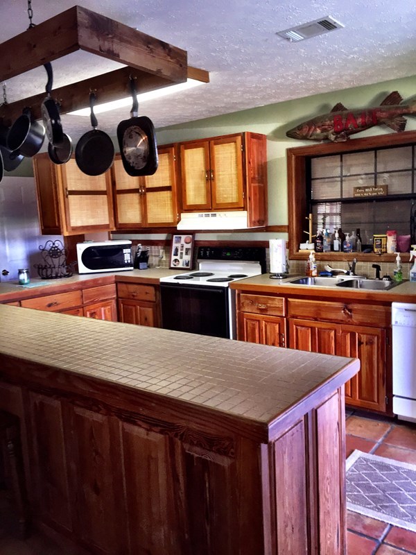 0 Fortner Mill Kite, GA 31049 - Photo 15 of 22 a kitchen with a stove a sink and a microwave