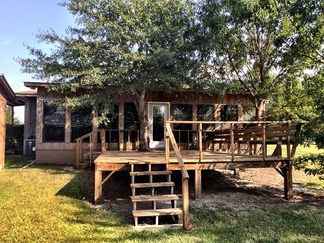 0 Fortner Mill Kite, GA 31049 - Photo 3 of 22 a view of a house with backyard porch and sitting area