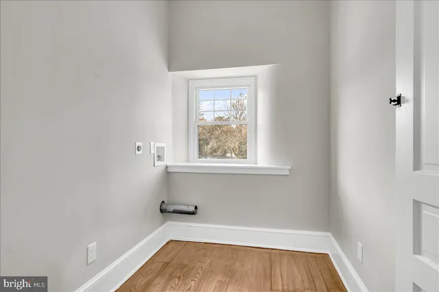 a view of a room that has a window in it