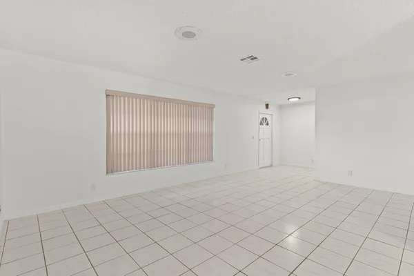 a view of an empty room with window