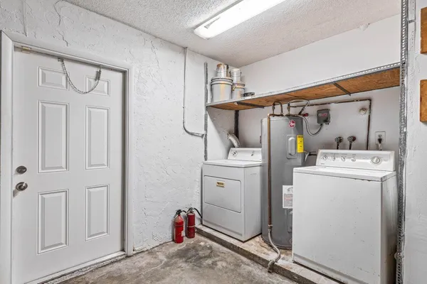 a utility room with dryer and washer