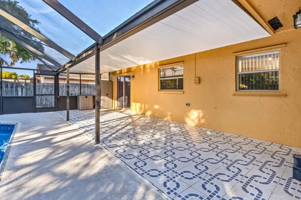 a view of a backyard of a house