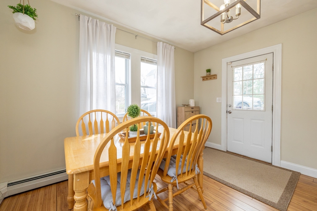 12 Post Road North Billerica, MA 01862 - Photo 11 of 38 a view of a dining room with furniture and a window