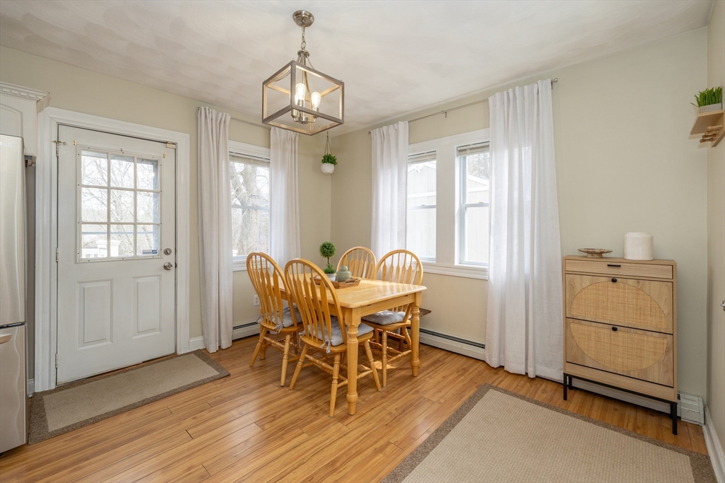 12 Post Road North Billerica, MA 01862 - Photo 12 of 38 a view of a dining room with furniture window and wooden floor