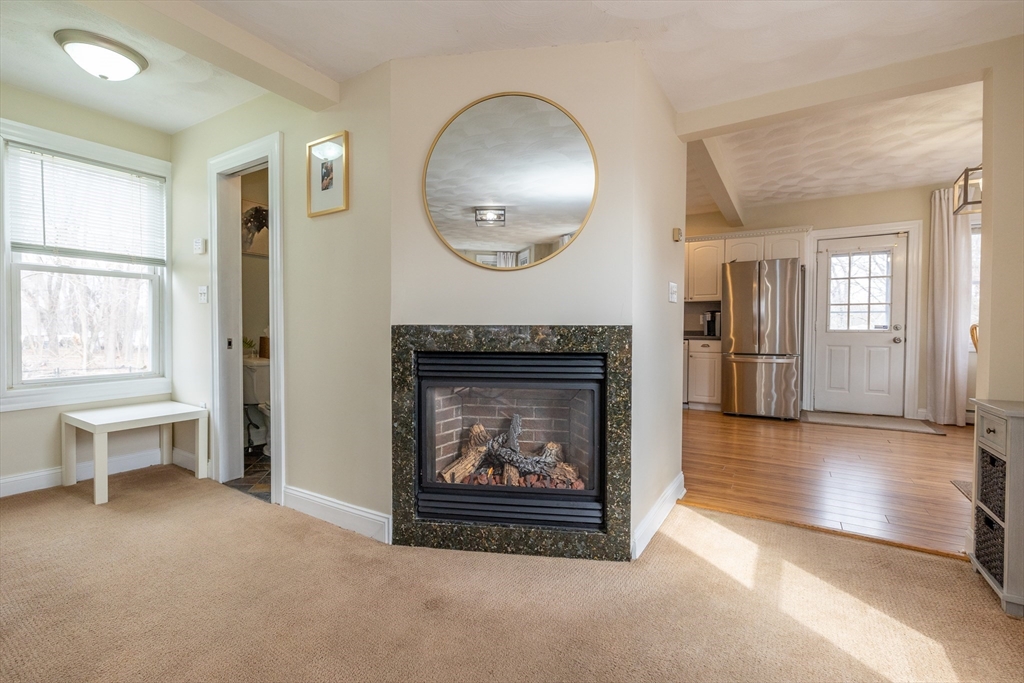 12 Post Road North Billerica, MA 01862 - Photo 14 of 38 an empty room with windows and fireplace