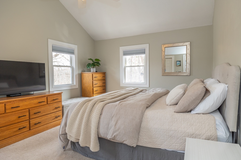 12 Post Road North Billerica, MA 01862 - Photo 23 of 38 a bedroom with a bed and flat screen tv