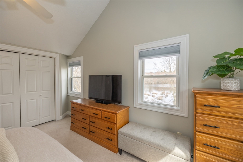 12 Post Road North Billerica, MA 01862 - Photo 25 of 38 a living room with furniture and a flat screen tv