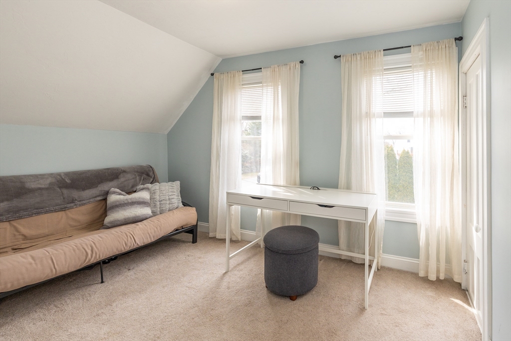 12 Post Road North Billerica, MA 01862 - Photo 28 of 38 a living room with furniture and a window