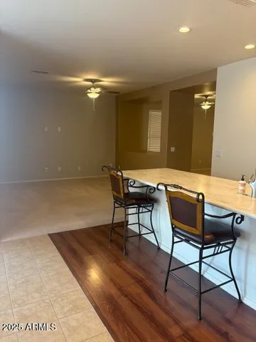 a workspace with furniture and wooden floor