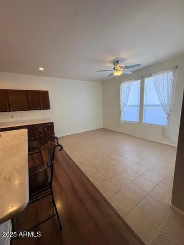 a view of an empty room with closet