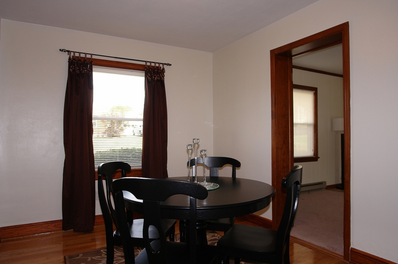 254 Post Road Roanoke, VA 24019 - Photo 3 of 25 a view of a dining room with a table and chairs
