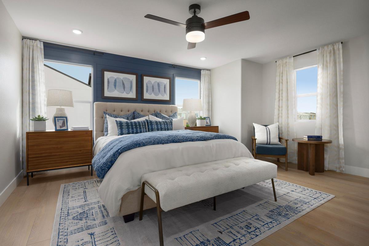 1122 Bengal Loop Rocklin, CA 95765 - Photo 4 of 6 a bedroom with a large bed rug and a window