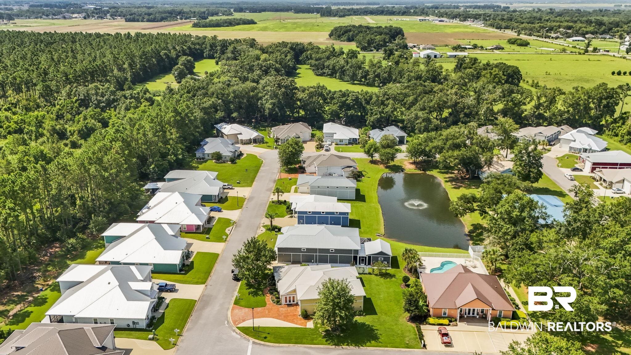 12361 Reunion Place Foley, AL 36535 - Photo 43 of 43 Aerial perspective of suburban area with a nearby body of water