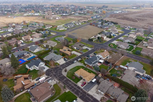 an aerial view of a city with lots of residential buildings