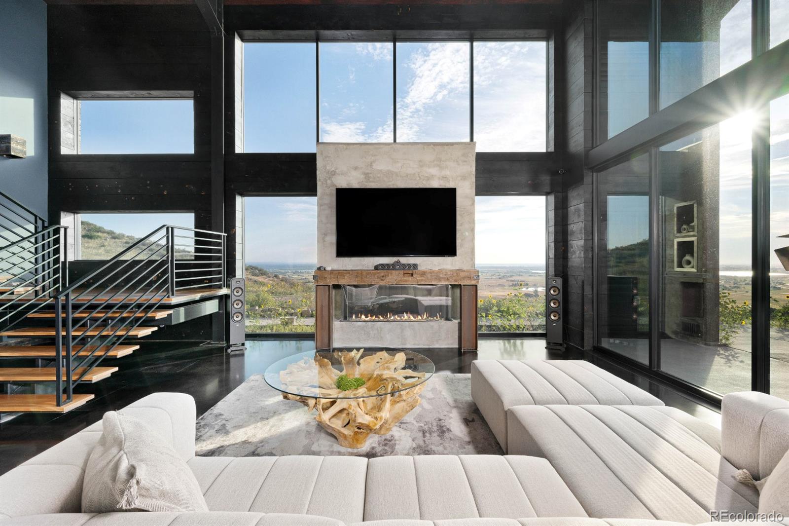 6502 Kiva Ridge Drive Berthoud, CO 80513 - Photo 12 of 50 a living room with fireplace furniture and a flat screen tv