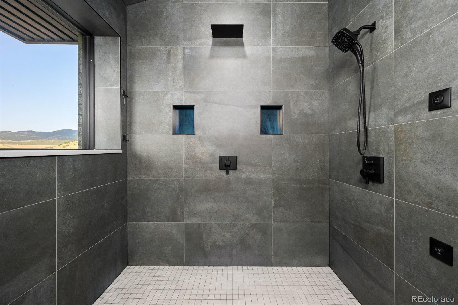 6502 Kiva Ridge Drive Berthoud, CO 80513 - Photo 38 of 50 a bathroom with a shower