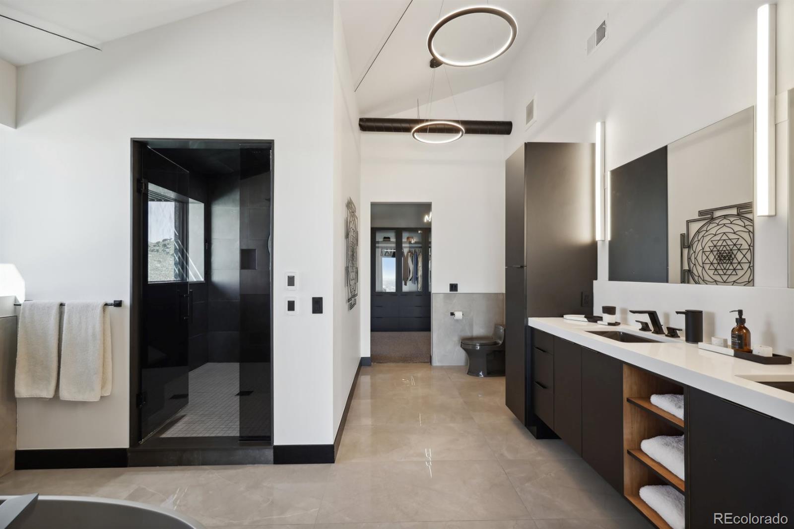 6502 Kiva Ridge Drive Berthoud, CO 80513 - Photo 39 of 50 a bathroom with a sink and a mirror