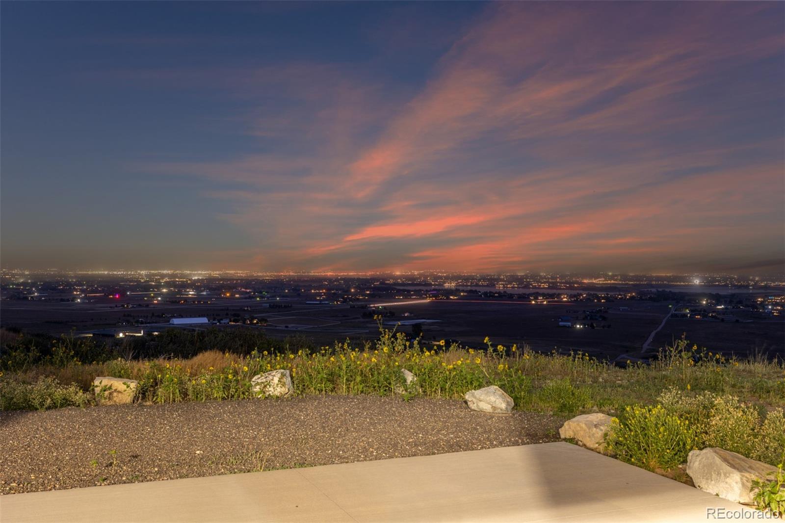 6502 Kiva Ridge Drive Berthoud, CO 80513 - Photo 8 of 50 a view of a lake from a yard