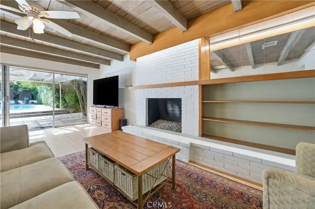 a living room with a couch and a flat screen tv