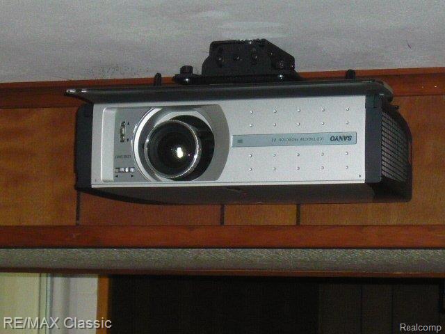 19480 Clement Road Northville, MI 48167 - Photo 13 of 24 BUILT-IN HOME THEATER