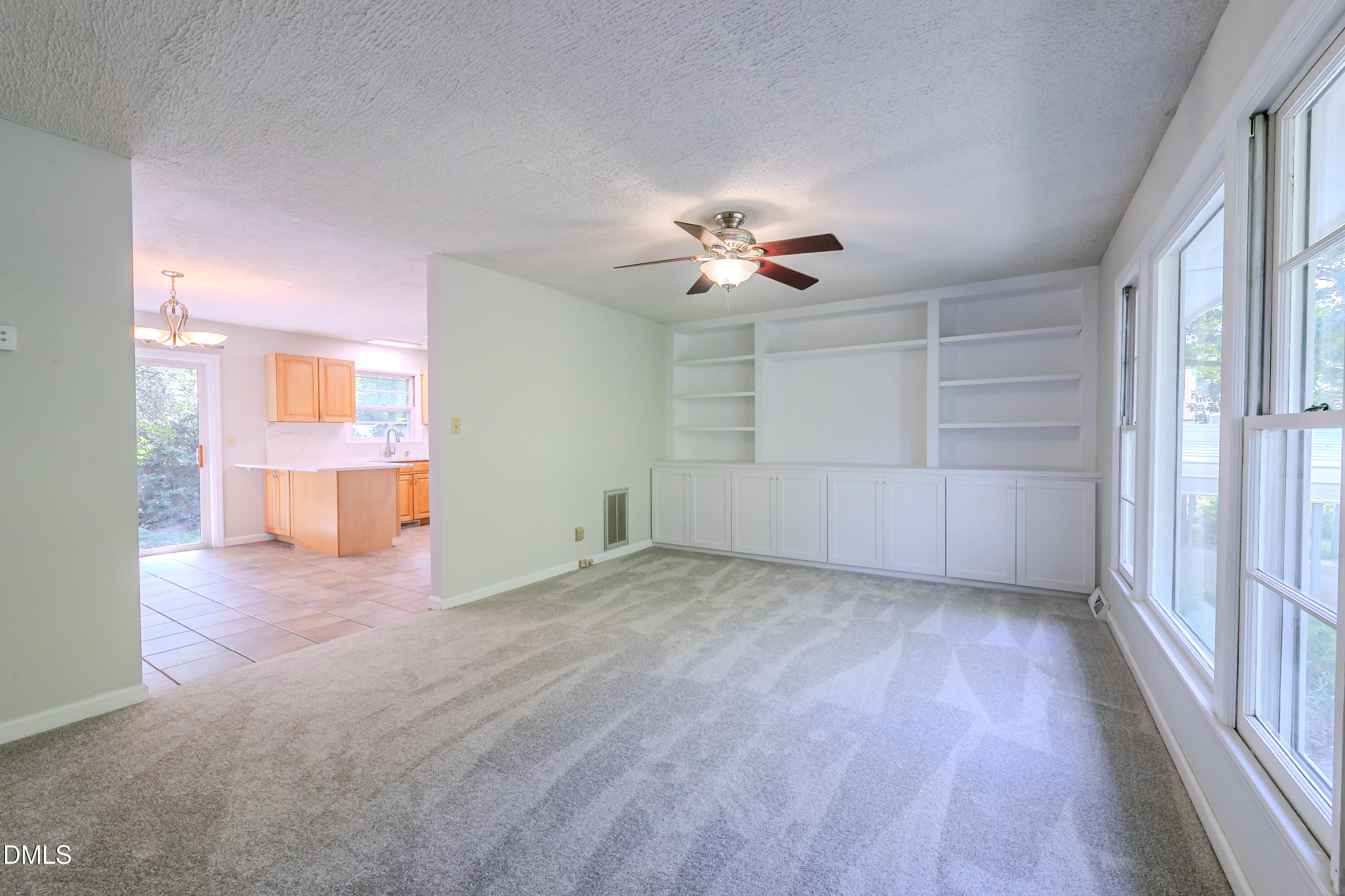 1308 Azalea Drive Raleigh, NC 27607 - Photo 3 of 24 Large Living/Family Room with Built in Bookshelves