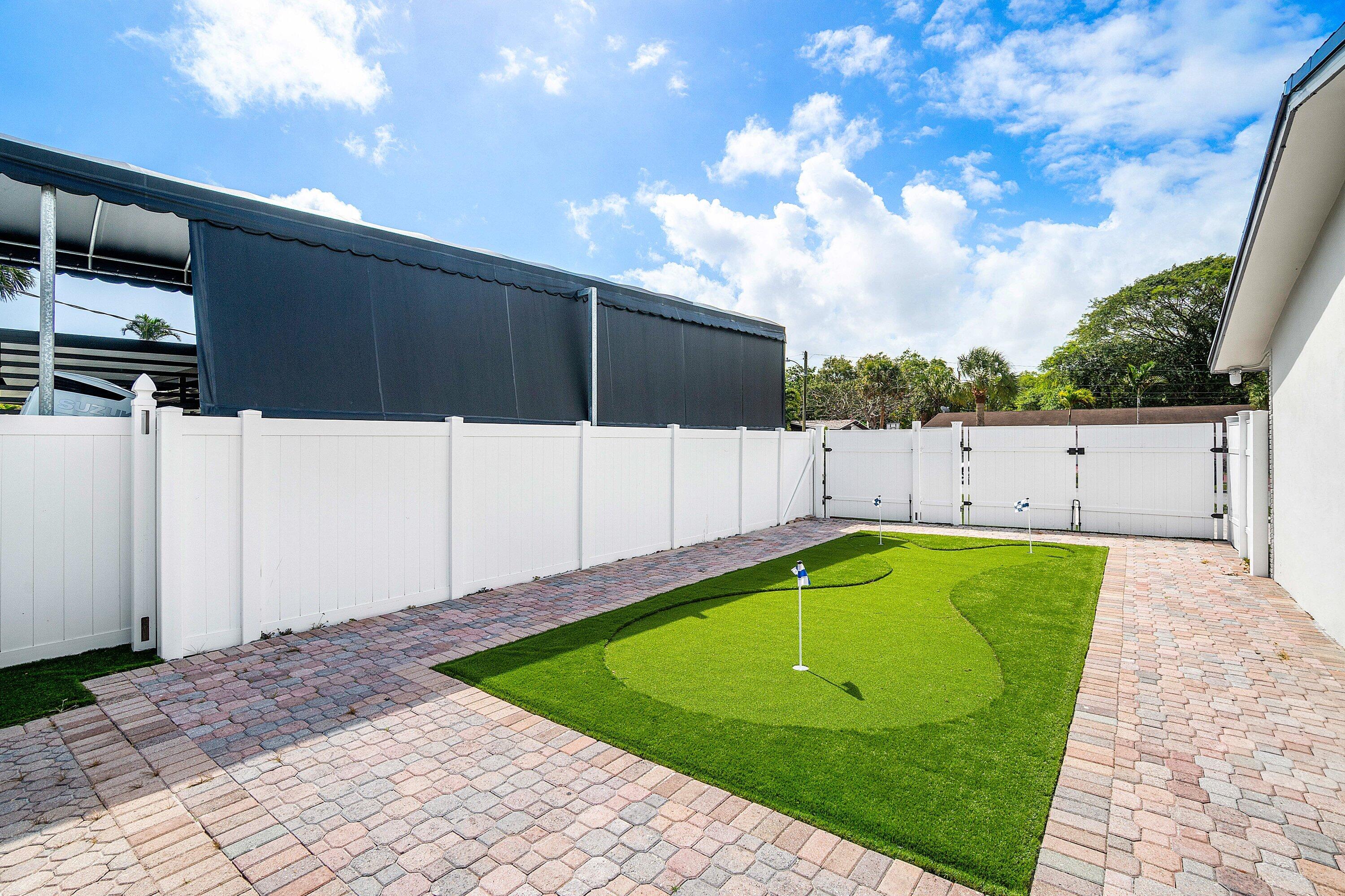 1531 Northwest 4th Street Boca Raton, FL 33486 - Photo 32 of 34 a view of a backyard