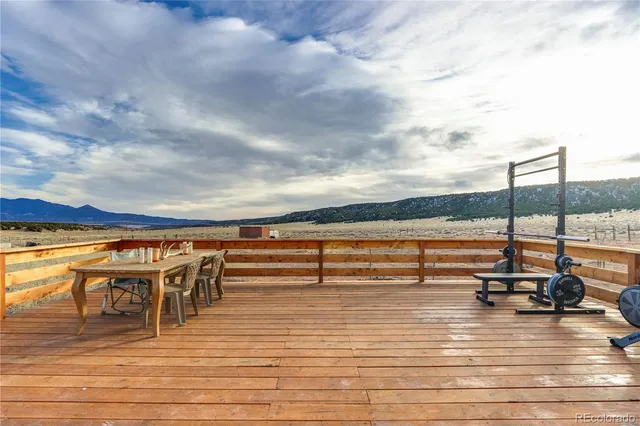 a front view of a house with a sitting space