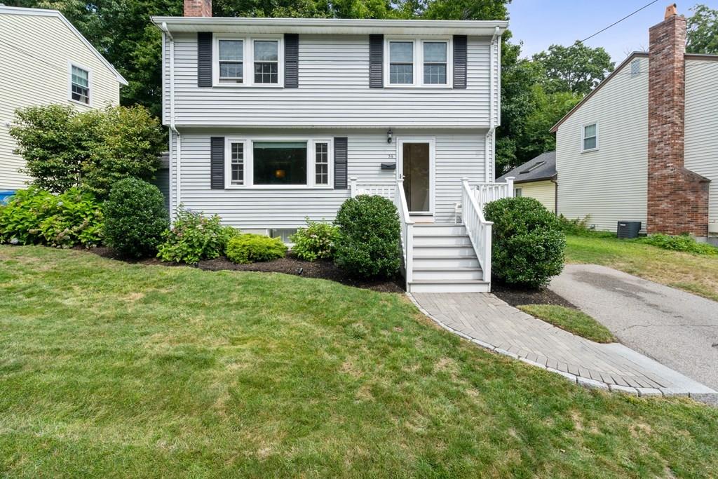 36 Intervale Road Waltham, MA 02453 - Photo 1 of 38 a front view of a house with a yard