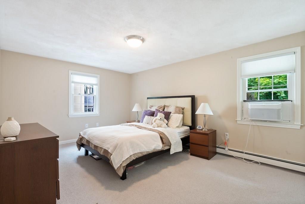 36 Intervale Road Waltham, MA 02453 - Photo 13 of 38 a bedroom with a bed and a window