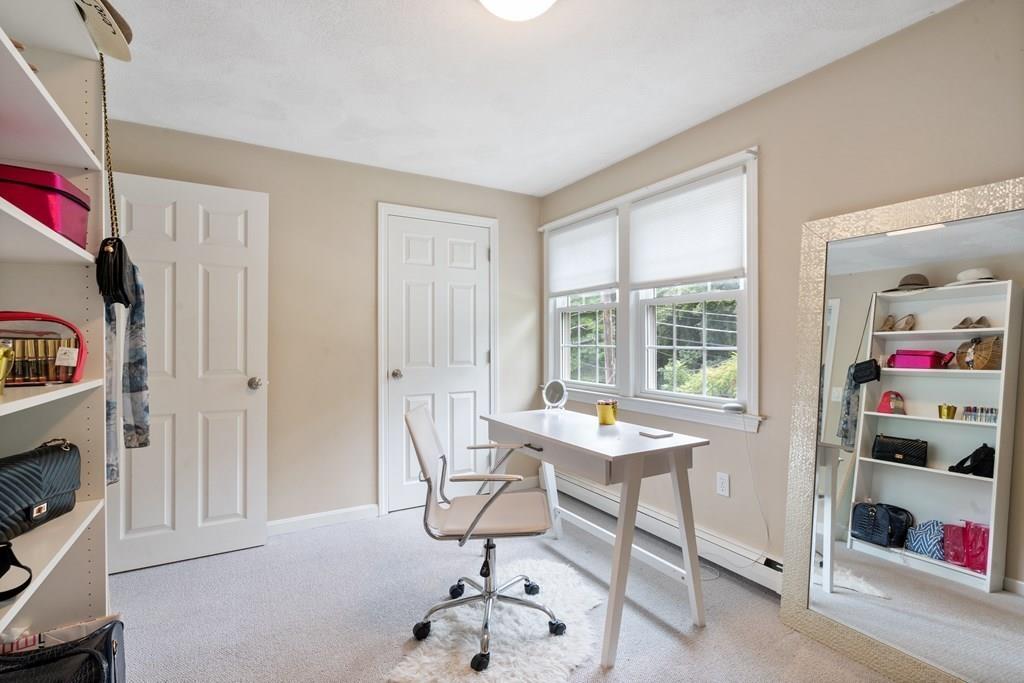 36 Intervale Road Waltham, MA 02453 - Photo 15 of 38 a view of a livingroom with furniture and workspace