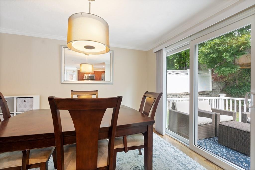 36 Intervale Road Waltham, MA 02453 - Photo 6 of 38 a view of a dining room with furniture window and wooden floor