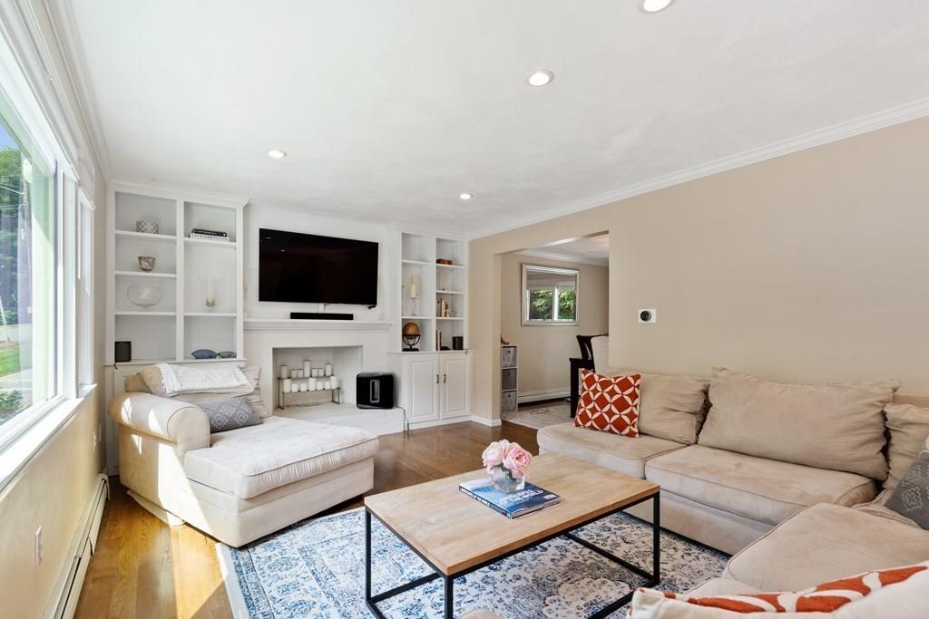 36 Intervale Road Waltham, MA 02453 - Photo 8 of 38 a living room with furniture and a flat screen tv