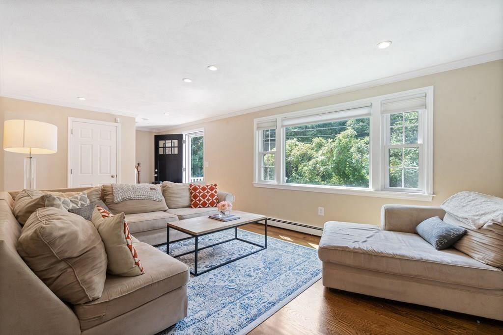 36 Intervale Road Waltham, MA 02453 - Photo 9 of 38 a living room with furniture and a large window
