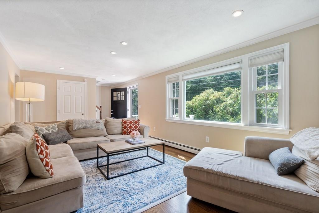 36 Intervale Road Waltham, MA 02453 - Photo 10 of 38 a living room with furniture and a window