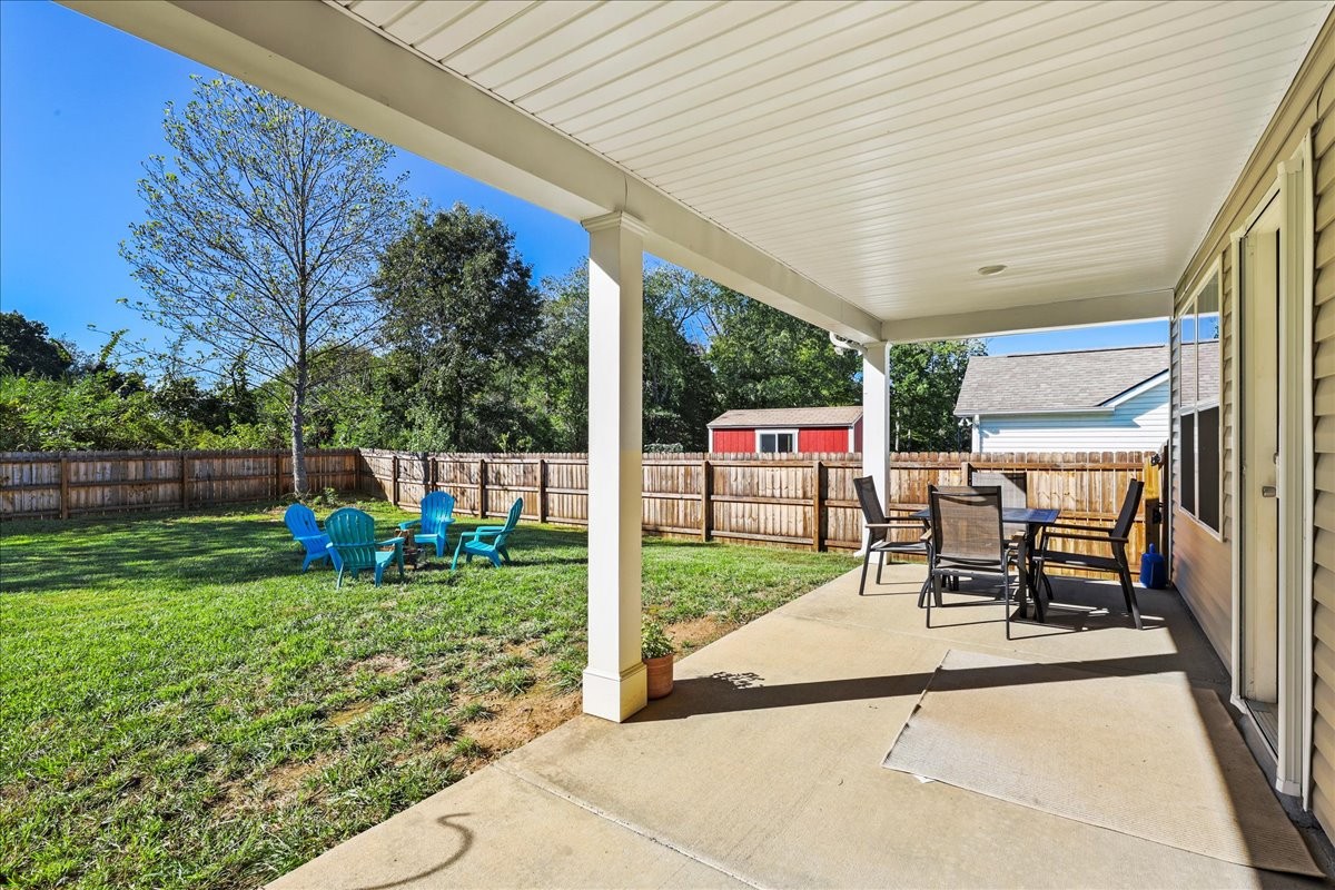 752 Cedar Street Springfield, TN 37172 - Photo 33 of 41 a view of a porch with chairs and backyard