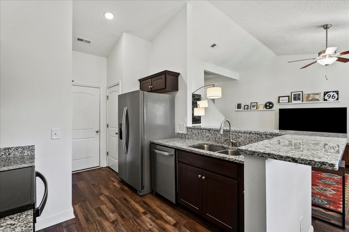752 Cedar Street Springfield, TN 37172 - Photo 8 of 41 a spacious bathroom with a granite countertop sink and a mirror