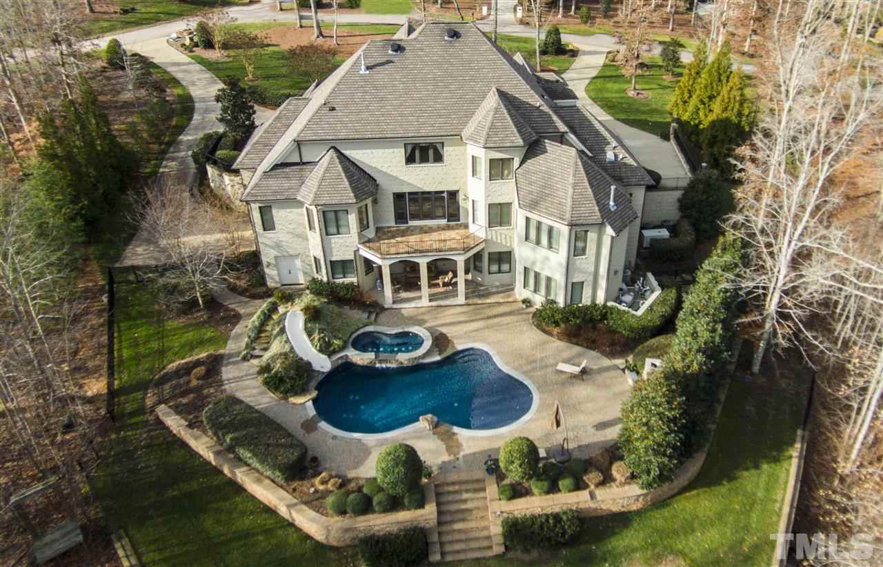 11200 Jonas Ridge Lane Raleigh, NC 27613 - Photo 1 of 25 an aerial view of a house with swimming pool garden and patio