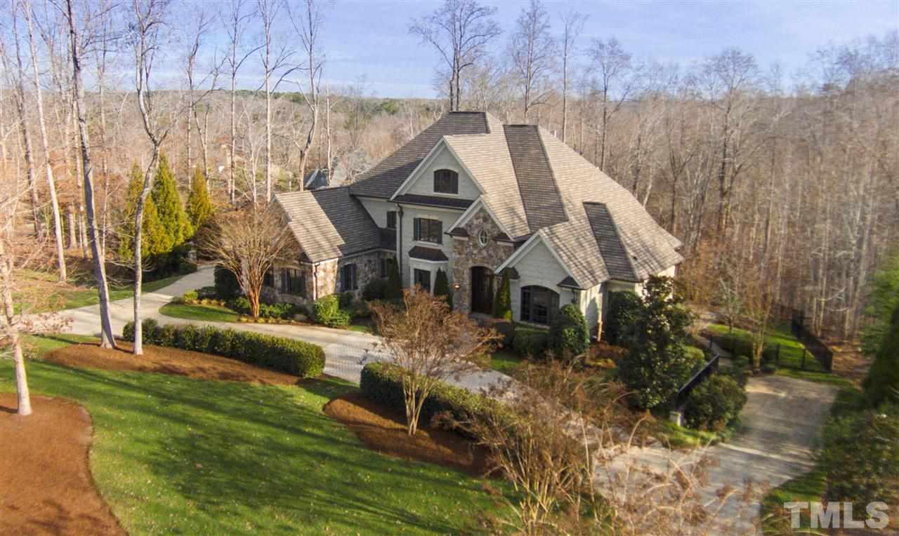 11200 Jonas Ridge Lane Raleigh, NC 27613 - Photo 2 of 25 a aerial view of a house with a yard