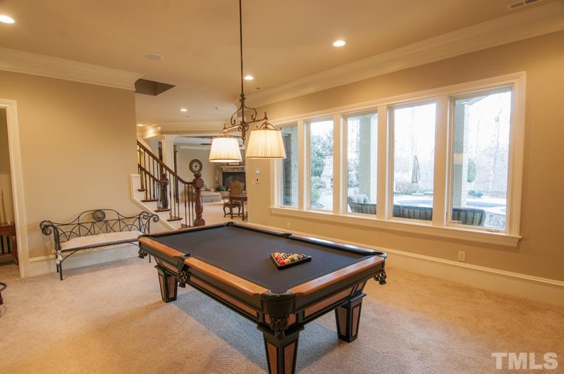 11200 Jonas Ridge Lane Raleigh, NC 27613 - Photo 19 of 25 a room with pool table and windows