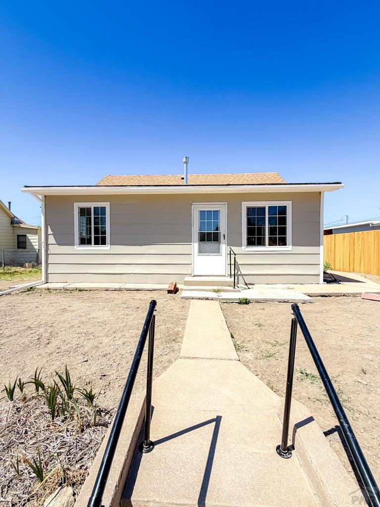 809 West 4th Street La Junta, CO 81050 - Photo 2 of 15 a view of a house with wooden deck