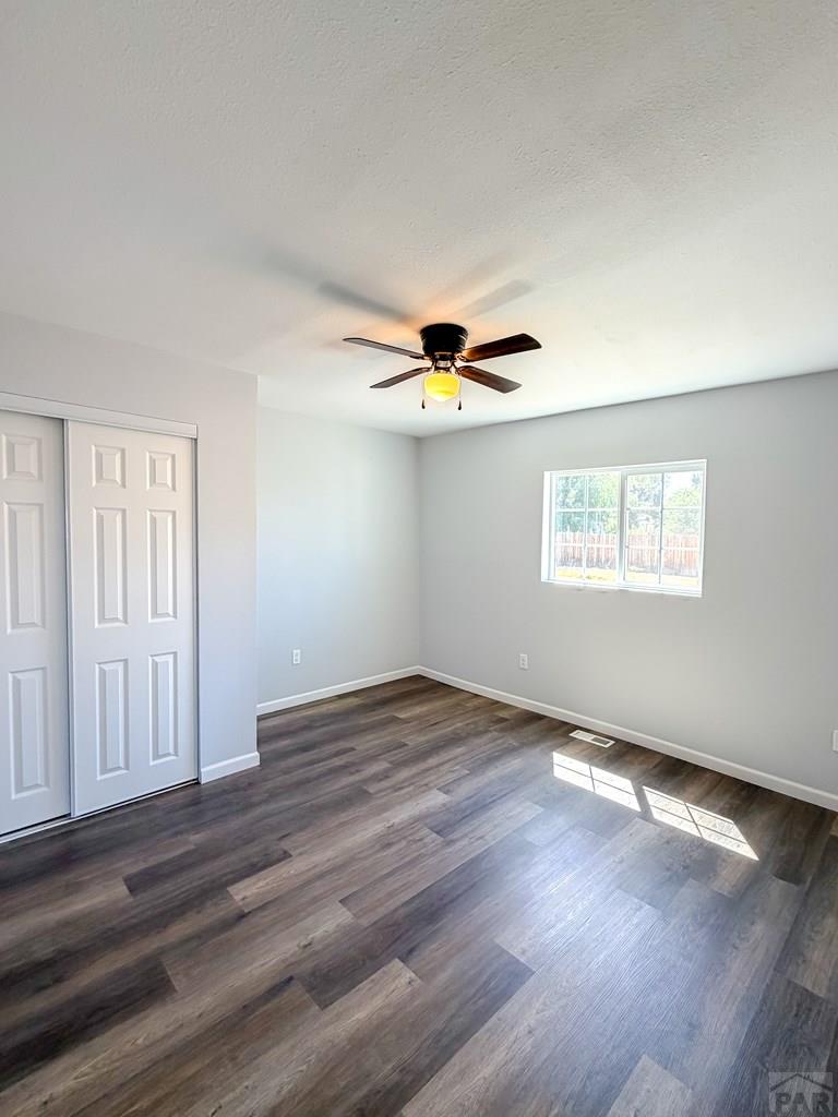809 West 4th Street La Junta, CO 81050 - Photo 6 of 15 a view of empty room with wooden floor