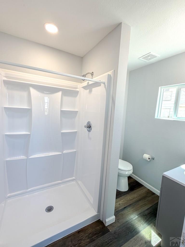 809 West 4th Street La Junta, CO 81050 - Photo 9 of 15 a bathroom with a shower and a toilet