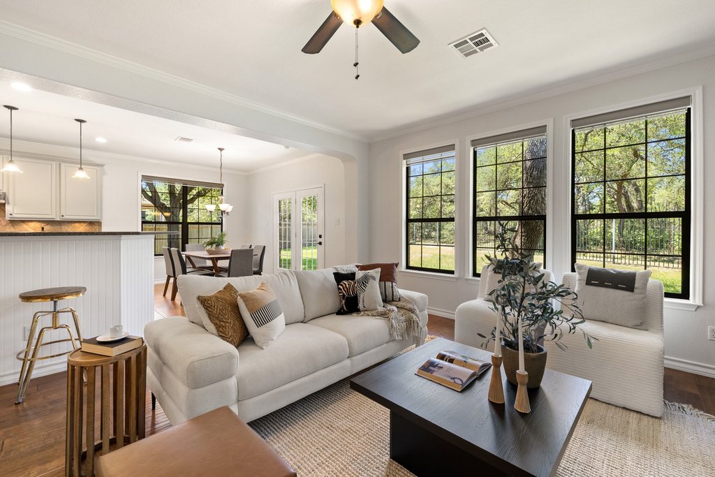 11129 Bastogne Loop Austin, TX 78739 - Photo 6 of 40 Natural light pours through triple rear windows overlooking the greenbelt beyond.