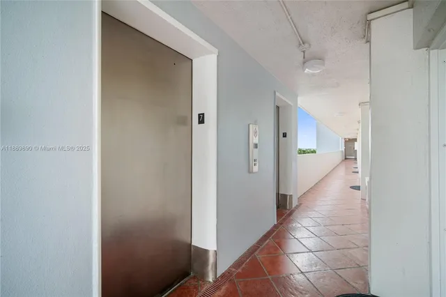 a view of a city with lawn chairs