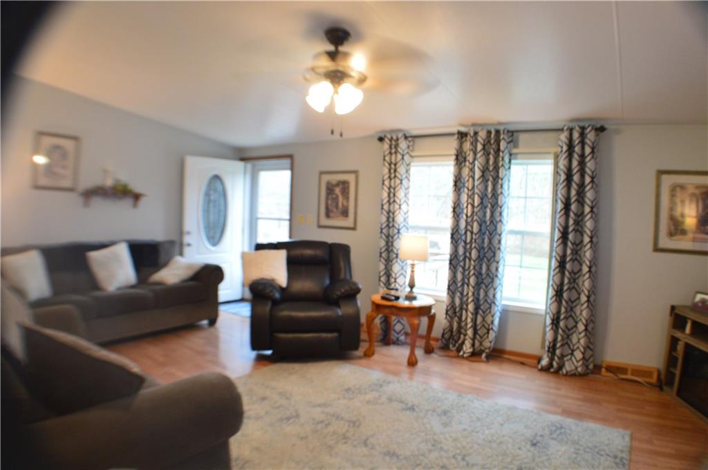 188 Cope Road Perryopolis, PA 15473 - Photo 2 of 21 a living room with furniture and a chandelier