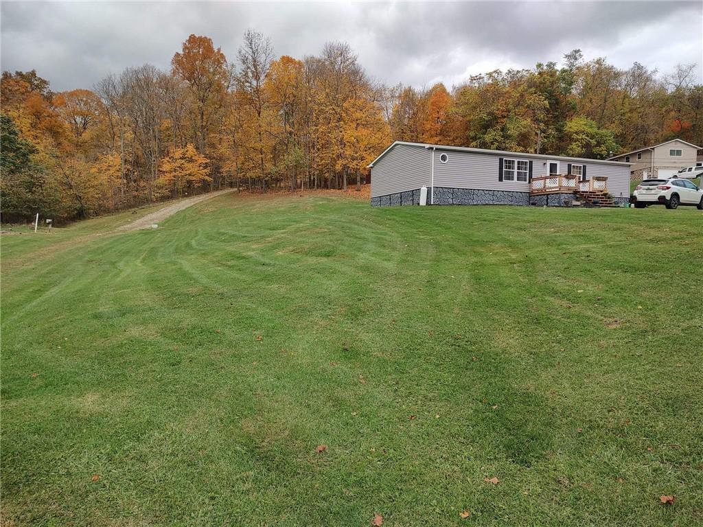 188 Cope Road Perryopolis, PA 15473 - Photo 21 of 21 a view of a house with a big yard