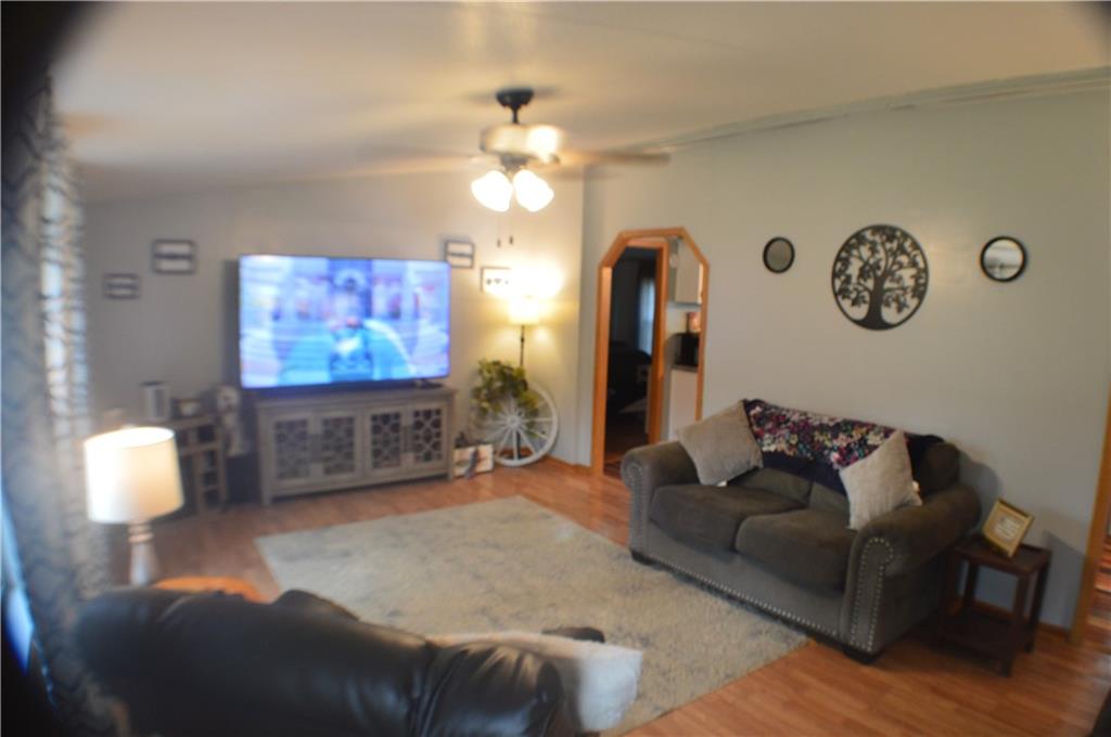 188 Cope Road Perryopolis, PA 15473 - Photo 3 of 21 a living room with furniture and a flat screen tv