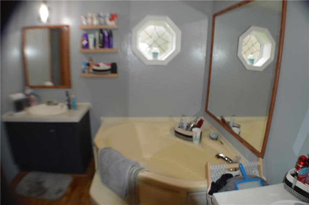 188 Cope Road Perryopolis, PA 15473 - Photo 9 of 21 a bathroom with a sink and a mirror